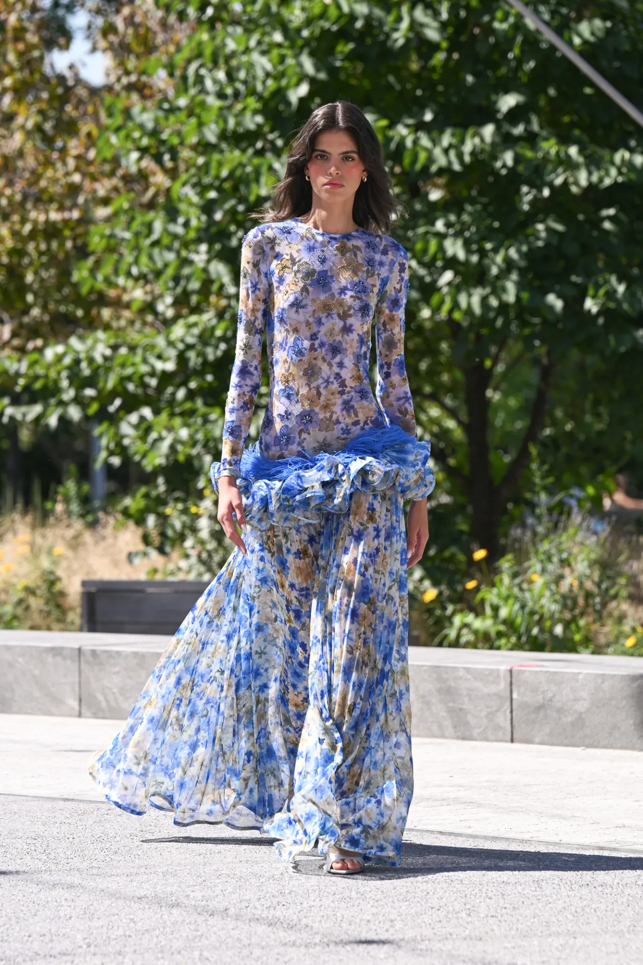Model in a sheer blue floral gown with ruffled feather trim, PatBO Spring 2027 ready-to-wear