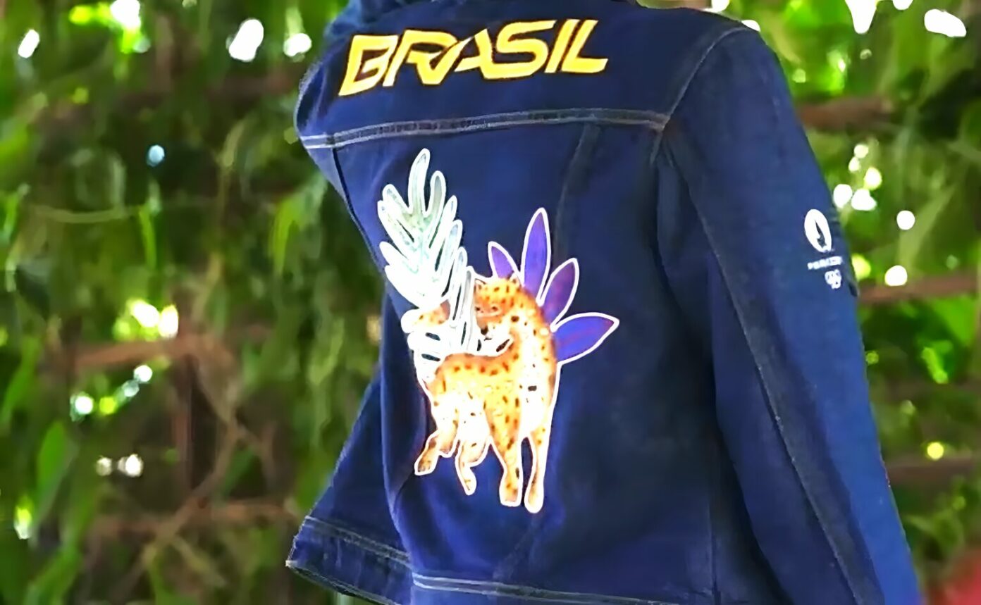 Team Brazil Olympic jacket embroidered with a jaguar and palm leaves by Seridó artisans
